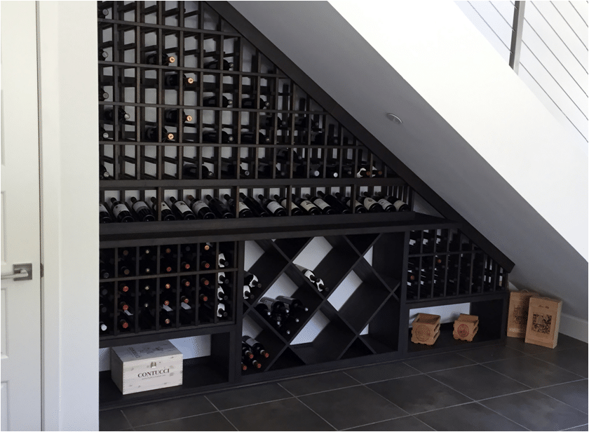 Under the stairs New Jersey wine cellar after completion